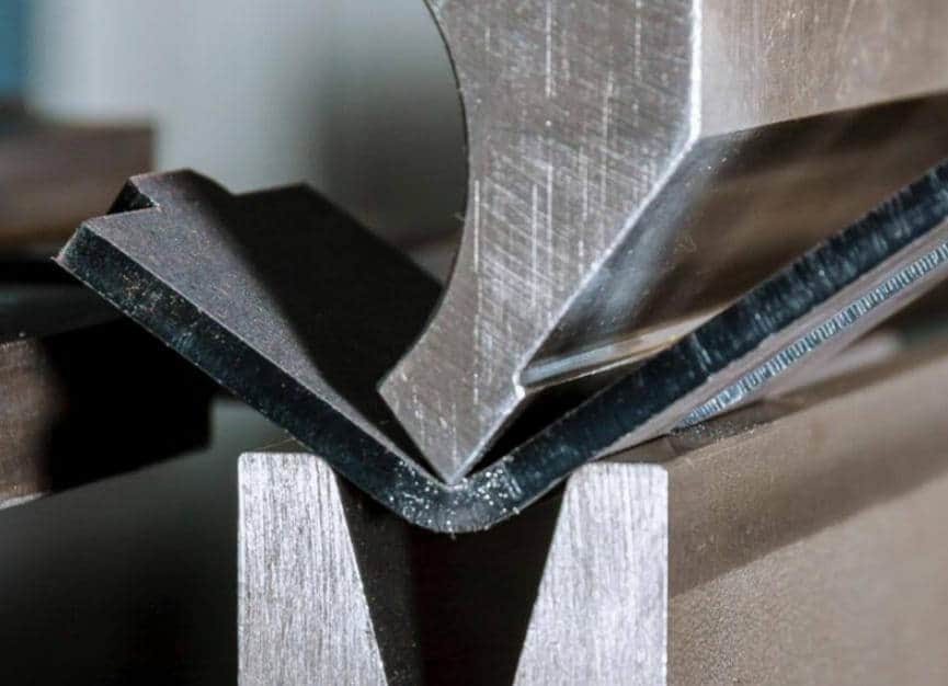 a metal piece of metal with a black rubber strip