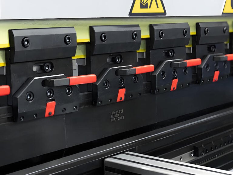 Overview of a quick style press brake clamping system mounted on the upper beam